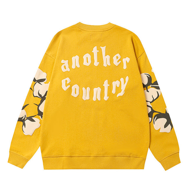 Denim Tears Yellow Crewneck Sweatshirt Front Floral Wreath Main Image